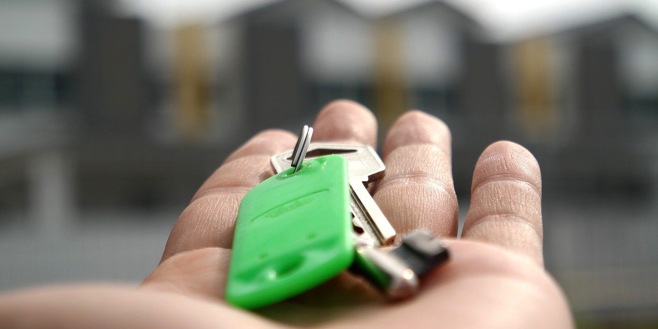 Hand with house keys
